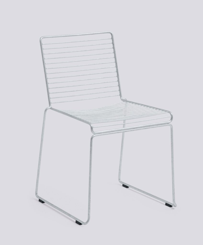 A silver wire-frame chair with a slatted backrest and seat on a plain background.