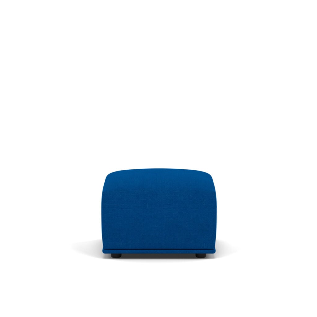 Blue upholstered ottoman with rounded edges on small black legs against a white background.